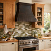 American craftsman kitchen with white oak shaker cabinets and riveted oil rubbed bronze hood