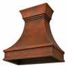 Rustic hammered copper range hood with bell shape and open underside prepared for a ventilation insert
