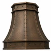 Faceted copper island range hood with riveted straps, hammered texture and antique patina