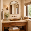 Brass scalloped shell bathroom sink with radial fluted design in a powder room
