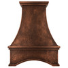 Hand hammered copper range hood with deep concave apron on white background
