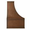 Side view of hammered antique copper range hood showing its deep apron and curved flared canopy