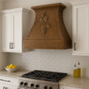 Tuscan 42-inch copper range hood in a transitional style kitchen