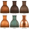 Domed copper range hood shown in six patina finish options for color and surface comparison