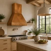 Custom tapered copper range hood with honey patina in an Organic Modern kitchen with white oak, plaster, and limestone