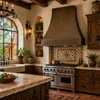Hand-hammered bell copper range hood in Hacienda kitchen with rustic wood, terracotta, stone and heavy beams