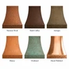 Hand-hammered bell copper range hood shown in six copper patina finishes for comparison
