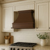 Hammered under-cabinet 36 x 24 inch copper stove hood in a transitional kitchen with tapered bell shape and clean banded trim