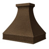 Luxury copper range hood with wide apron and small crown molding side view on white background,