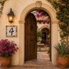 Talavera tile plaque number four with Mexican floral border showcased on an arched doorway with classic Spanish Colonial character