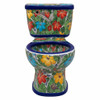 Front view of a Mexican hand-painted multicolor Talavera floral toilet