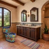 Spanish revival style bathrom with a Mexican hand-painted multicolor Talavera floral toilet