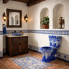 Mexican hand-painted blue and white Talavera toilet in a Spanish Colonial style bathroom