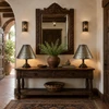 Mexican punched tin cone lamp shade with geometric motifs over a hacienda entryway console