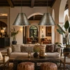 Mexican punched tin cone lamp shade with geometric motifs in a boutique hotel lounge