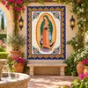 Our lady Guadalupe Mexican mural featured in a garden sanctuary with lush natural plants.