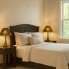 Mexican jewel-studded punched tin cone pendant lamps in a bedroom with lights on