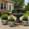 Talavera flower planter with a multicolor motif decorating a suburban house back yard patio
