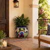 Hand-painted flower planter with blue green scrolls – Dolores Hidalgo design on a covered porch