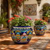 Talavera planter with floral lattice pattern displayed on a sunlit Spanish patio