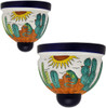 Two Mexican talavera wall sconces with lizard and desert sun design on white