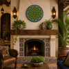 Green mandala decorative talavera plate with navy geometric accents above a fireplace