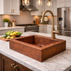Transitional suburban kitchen with an over-the-counter hammered apron copper bar sink