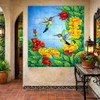 Mexican hummingbird floral talavera tile mural design in entryway wall enhancing space with vivid colors and artisanal character