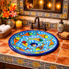 Round talavera bathroom sink colorful fish design in restaurant washroom with vibrant decor
