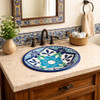 Round talavera bathroom sink turquoise floral design in Mediterranean vanity with natural light