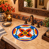Round talavera bathroom sink terracotta petal motif in an elegant hacienda powder room