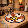 Round talavera bathroom sink terracotta cross pattern Mexico in a Spanish Revival bathroom with tile vanity and warm tones