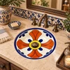 Round talavera bathroom sink terracotta cross pattern Mexico in a Mediterranean bathroom