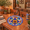 Round talavera bathroom sink multicolor floral Mexican design in a Southwestern style interior
