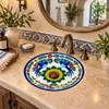 Round talavera bathroom sink bird floral design Mexico in a Mediterranean bathroom setting