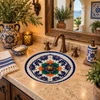 Round talavera bathroom sink floral Mexican design set in an elegant Mediterranean bathroom
