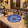 Round talavera bathroom sink blue white floral design in a Spanish colonial bathroom