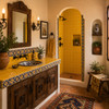 Handmade solid yellow Mexican talavera tiles for warm vibrant interiors featured in a hacienda bathroom with artisan details
