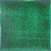 Emerald green Mexican ceramic tile backsplash with handcrafted glaze in a Spanish Colonial kitchen