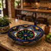 Double sided hand painted oval bathroom sink talavera in rustic kitchen bar with Mexican decor