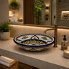 Double sided hand painted oval bathroom sink arabesque pattern in modern spa setting