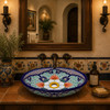 Coral floral double sided hand painted oval bathroom sink in Spanish Revival vanity with Talavera accents