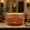 Orange petal double sided hand painted oval bathroom sink featured in a luxury bathroom interior