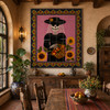 La catrina talavera tile mural in a rustic dining room with wood furniture and handcrafted accents.