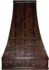 Tall  hammered copper range hood with decorative apron