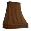 Tall copper range hood with decorative apron angled view