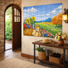Mexican talavera countryside harvest tile mural design in entryway creating inviting focal point