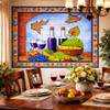 Colorful wine and fruit talavera tile mural design in dining room with Spanish accents