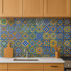 Mexican tile set with mixed patterns decorating a kitchen backsplash