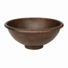 Front view of round copper vessel sink with raised base, wide open bowl, and smooth rolled rim